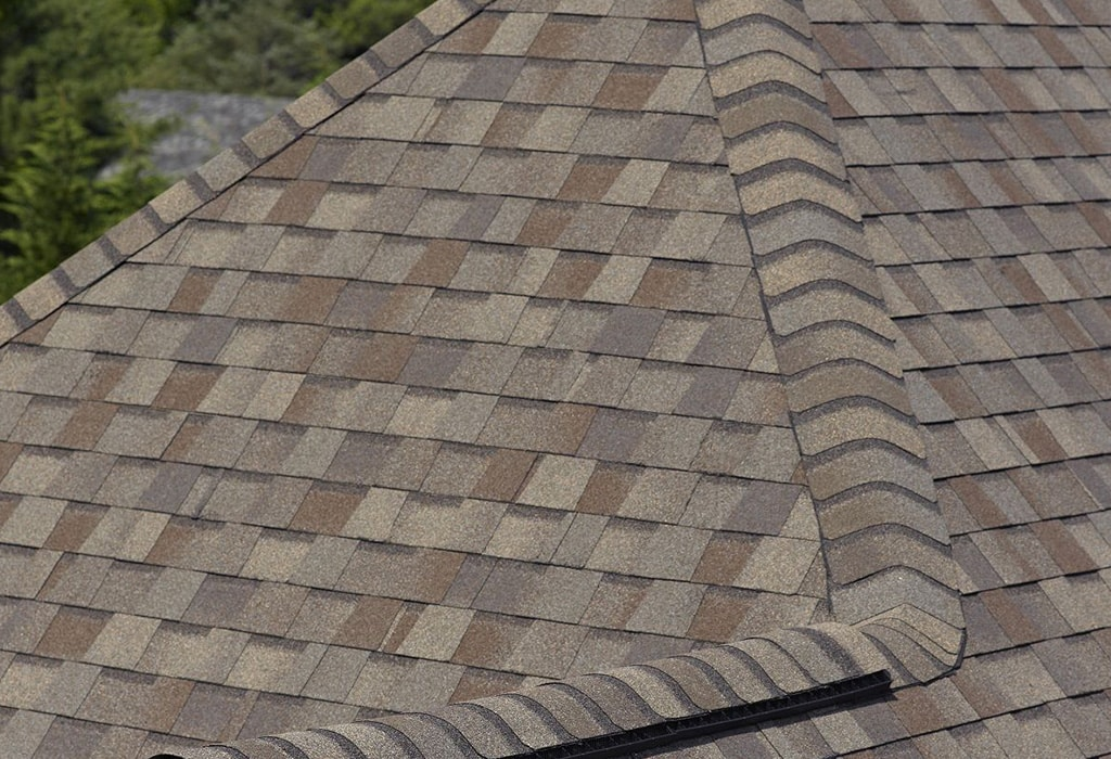 Close-up view of a shingled roof with detailed patterns, showcasing the craftsmanship by General Roofing Company in Oakland.
